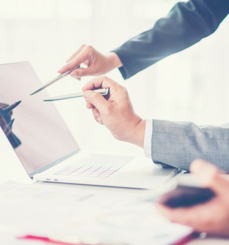 Business adviser analyzing financial figures denoting the progress in the work of the company